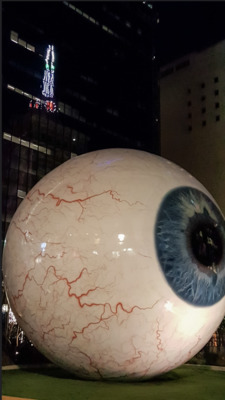 a large white ball with an eyeball on it