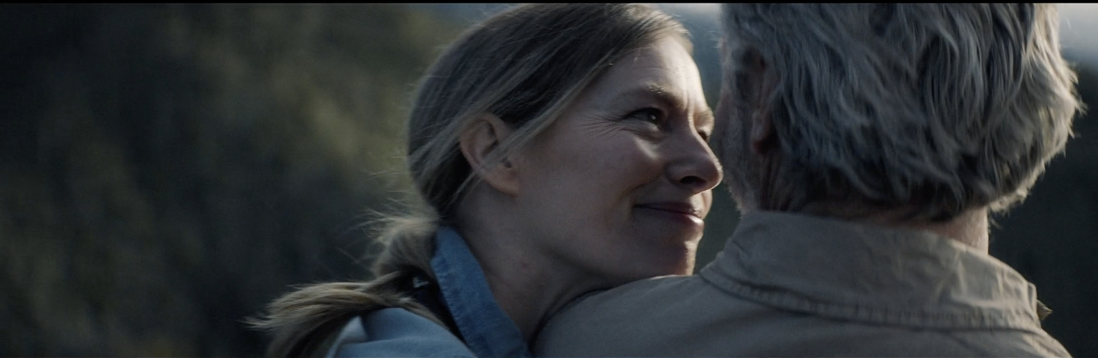 a man and a woman standing next to each other