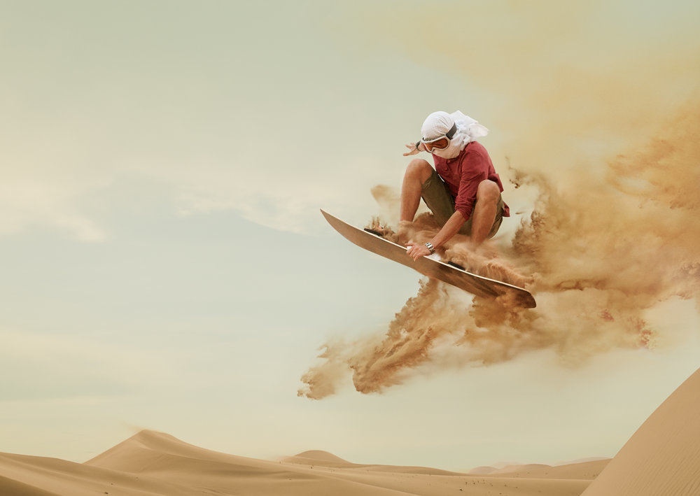 a man riding a surfboard through the air