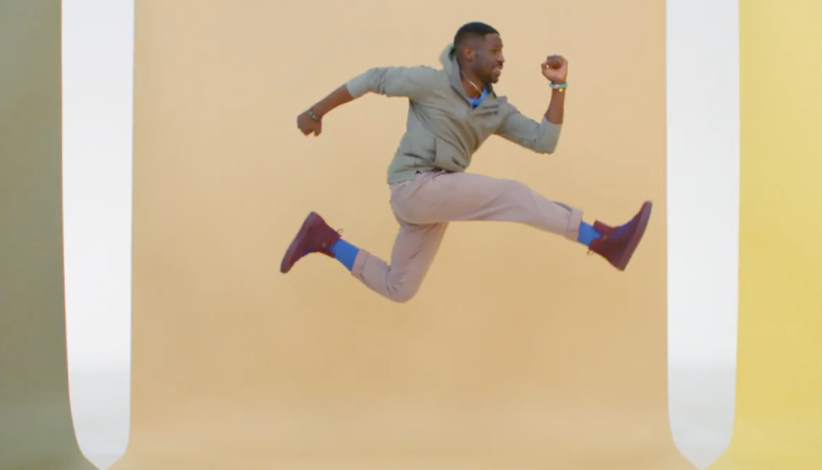 a man is jumping in the air with his feet in the air