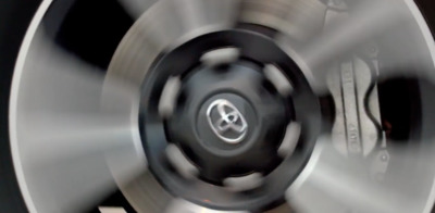 a close up of a metal object with a blurry effect