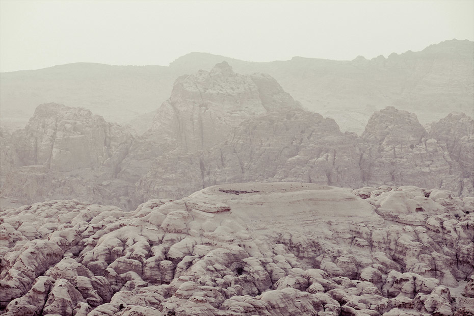 a mountain range covered in snow and rocks