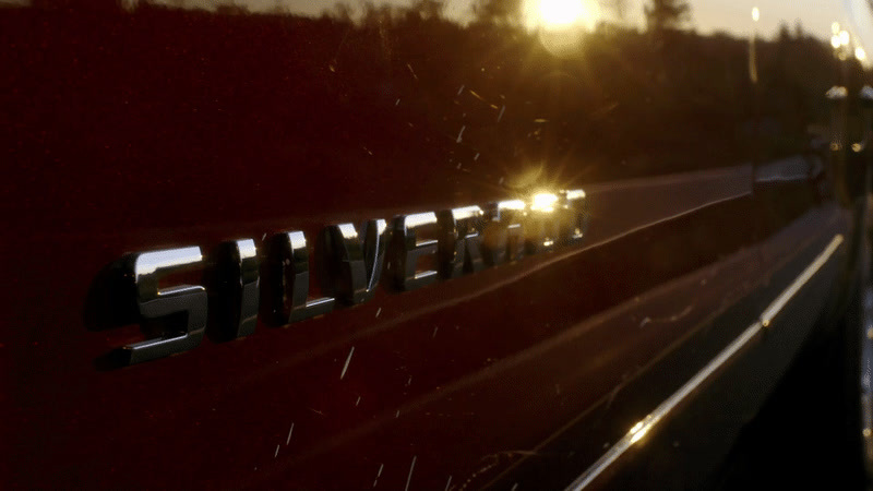 a close up of the word chevrolet on the side of a car