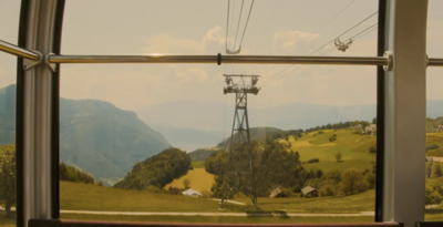 a view of a mountain from a window