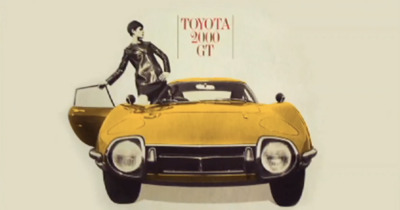 a drawing of a woman standing on top of a yellow car