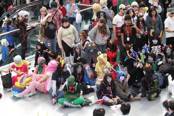 a group of people dressed up in costumes