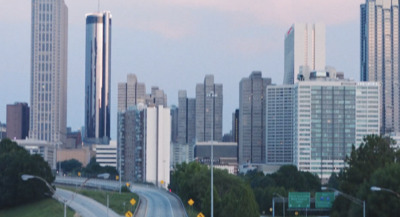 a view of a city with tall buildings