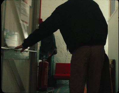 a man standing in front of a refrigerator freezer