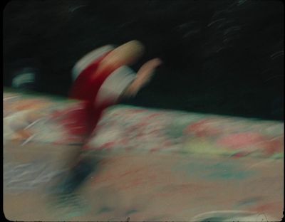 a blurry photo of a person on a skateboard