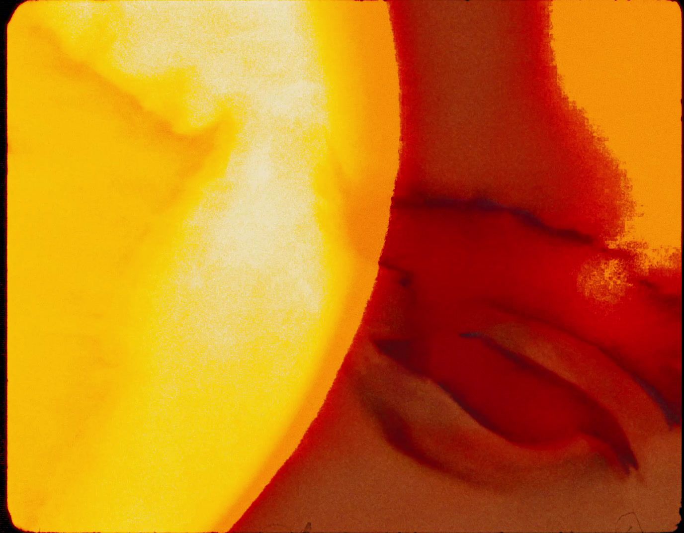 a close up of a person's hand with a yellow background