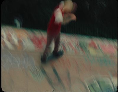 a blurry photo of a person on a skateboard