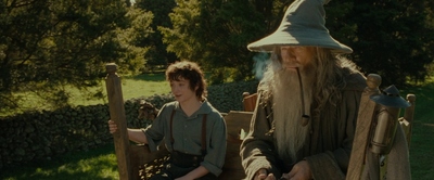 an image of a wizard and a wizard sitting on a bench