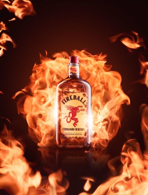 a bottle of fireball gin on fire