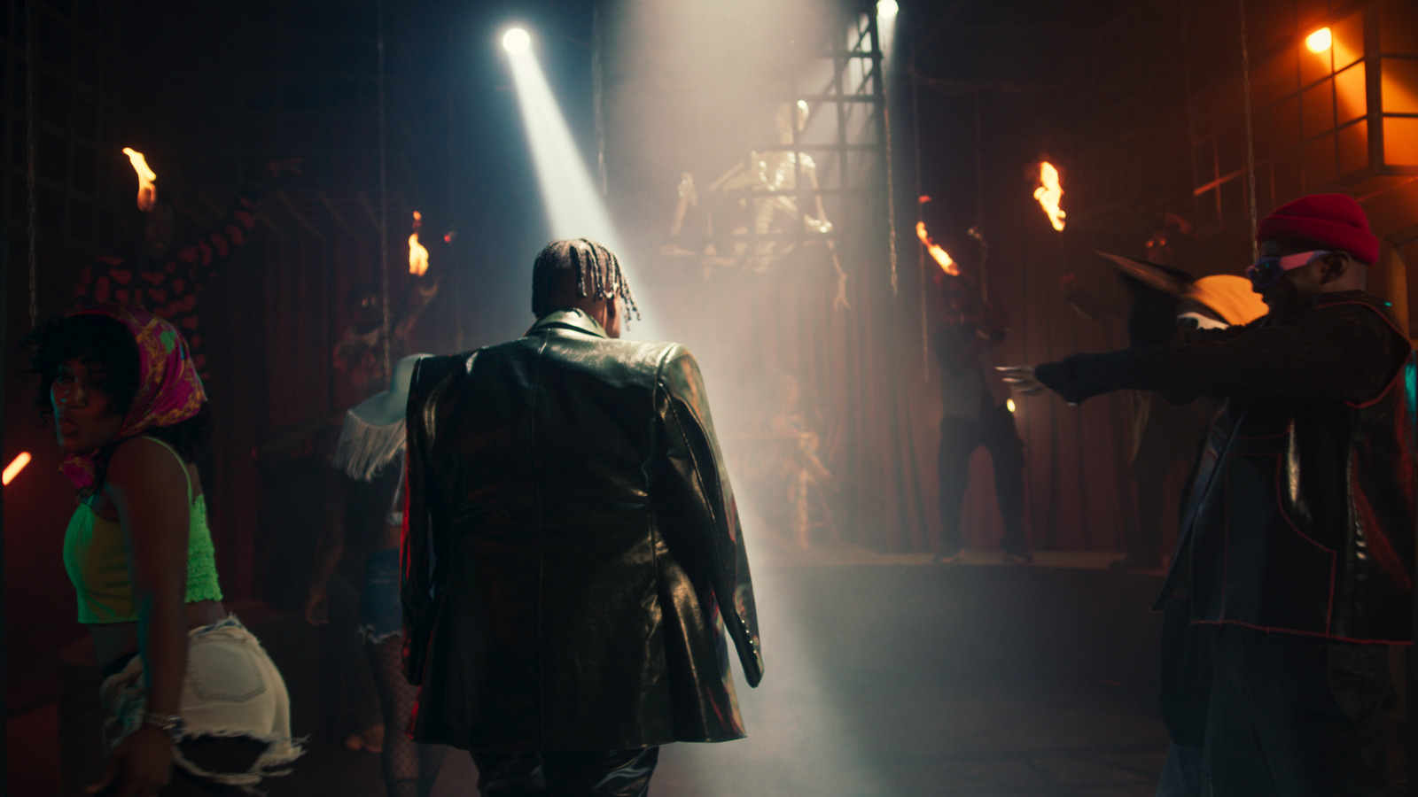 a group of people standing around a stage