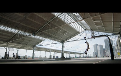 a person jumping in the air with a skateboard