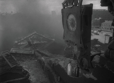 a black and white photo of a clock tower