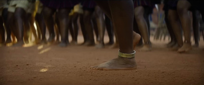 a group of people standing around each other