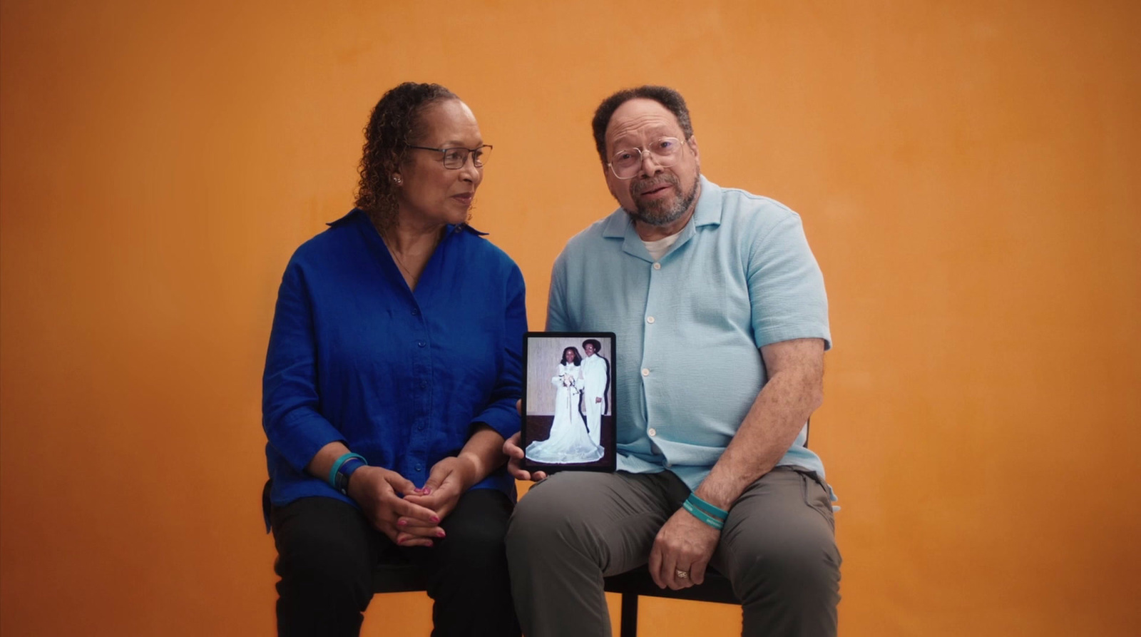 a man and woman sitting next to each other