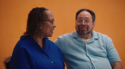 a man and a woman standing next to each other