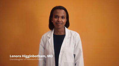 a woman in a lab coat posing for a picture