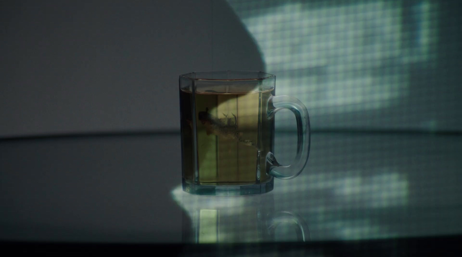 a cup of tea sitting on top of a table