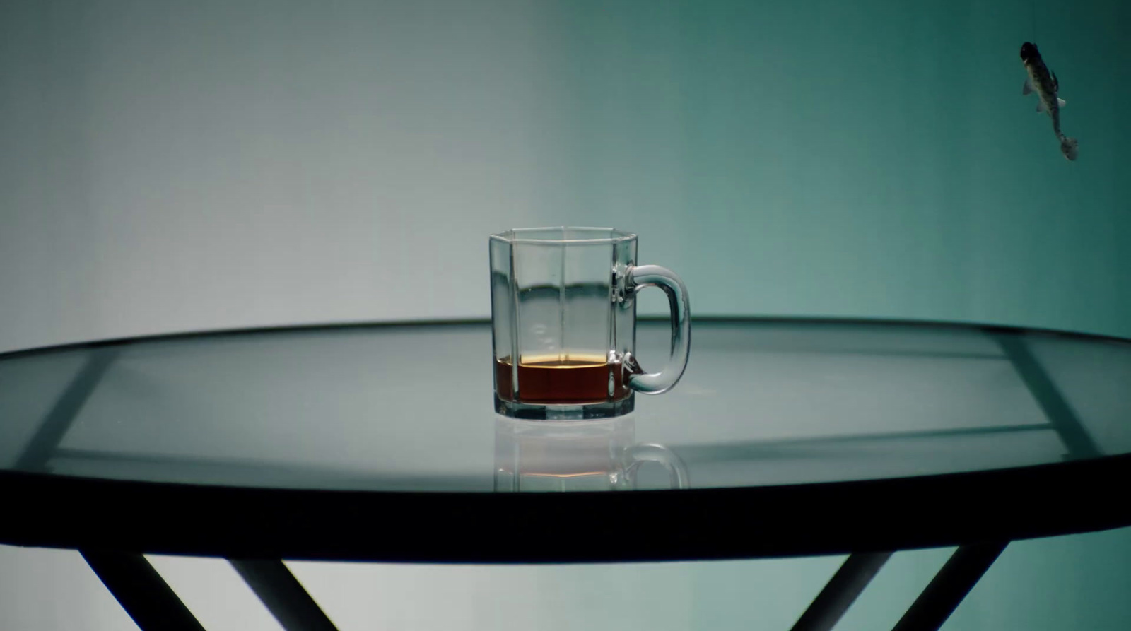 a glass of tea sits on a table