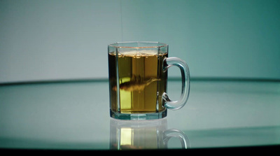 a cup of tea sitting on top of a table