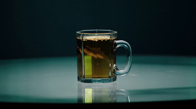 a cup of tea sitting on top of a table