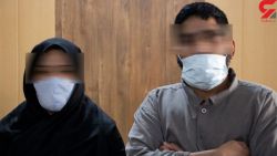 a man and a woman wearing face masks