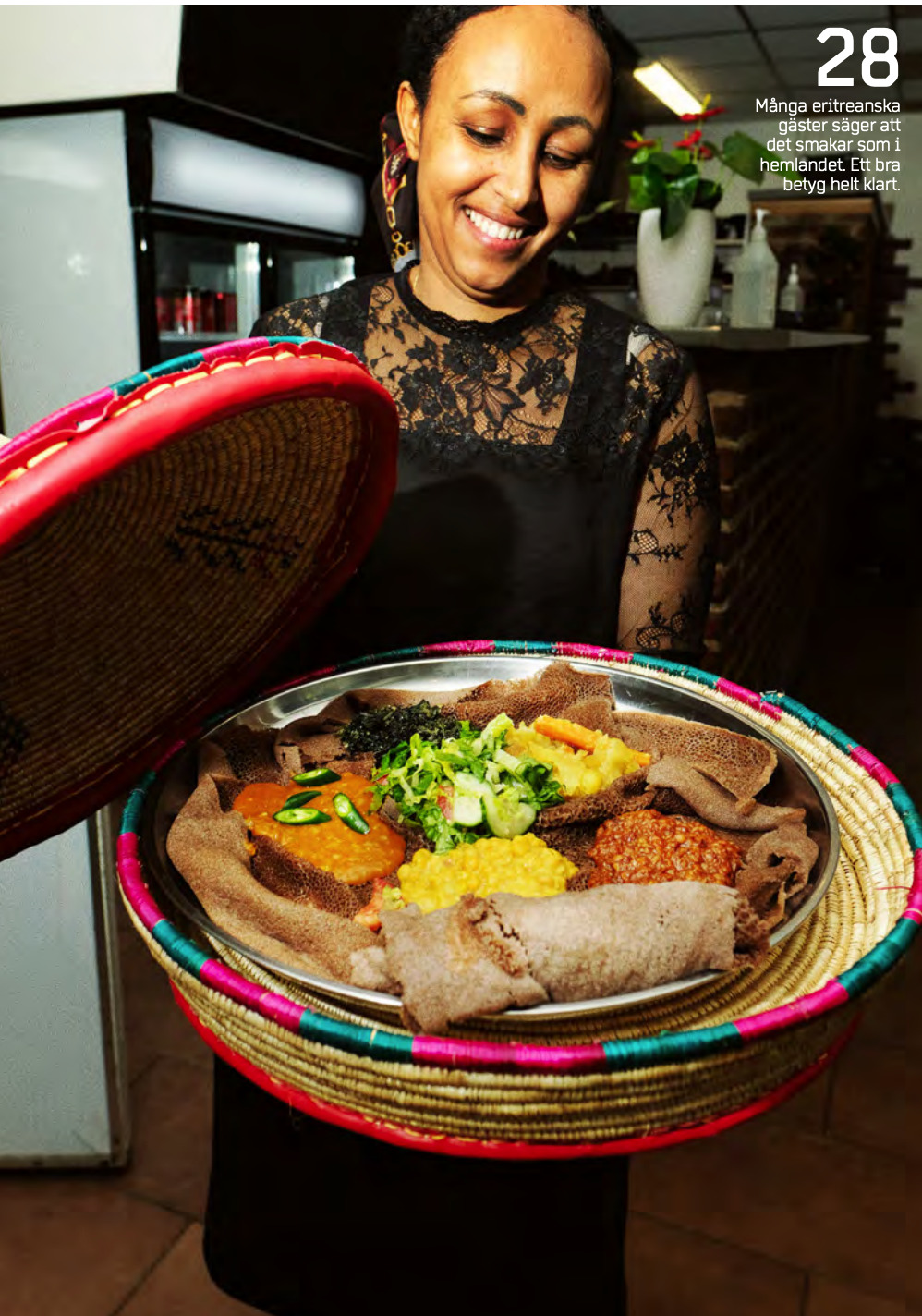 a woman holding a plate of food in her hands