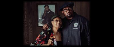 a man standing next to a woman in a room