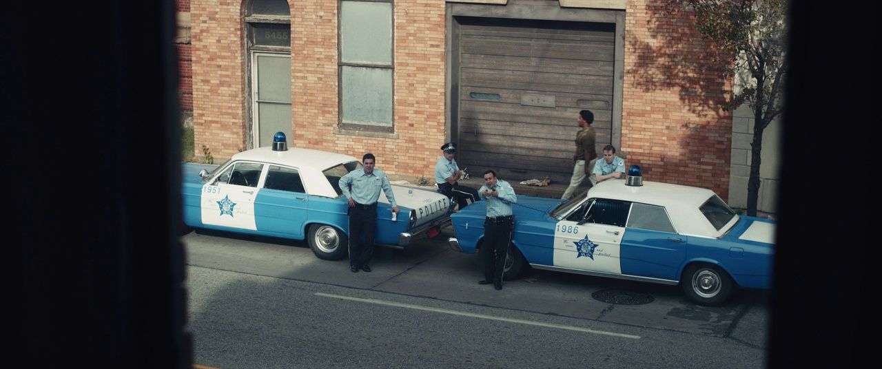 a couple of police cars parked next to each other