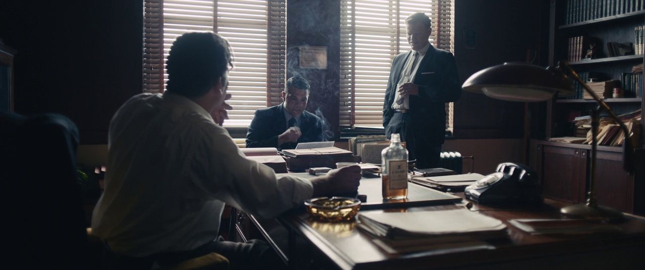 a group of people sitting around a table