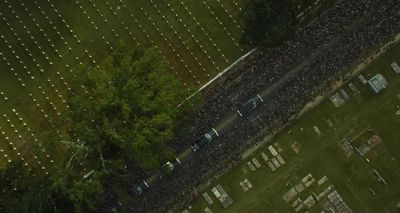 an aerial view of a cemetery in a park