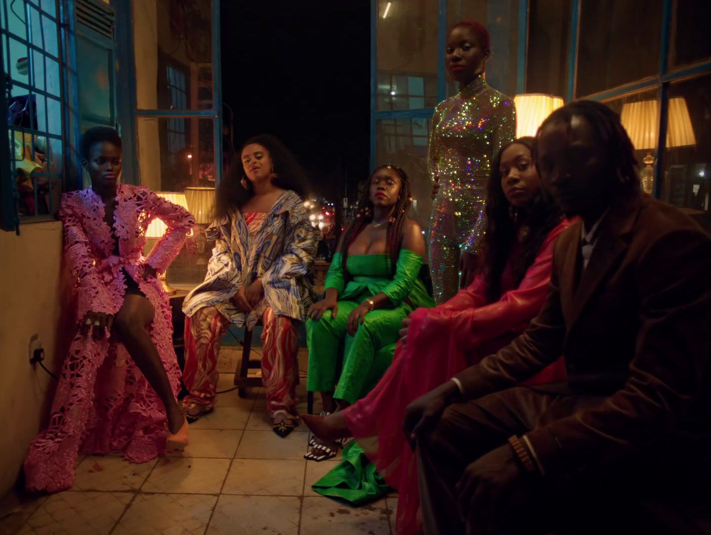 a group of women sitting next to each other