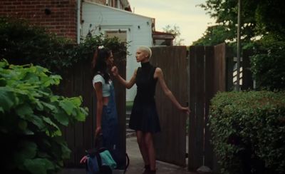 a couple of women standing next to each other