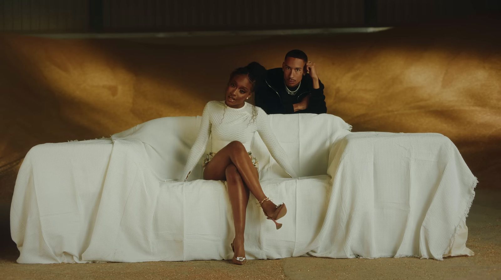 a man and a woman sitting on a couch