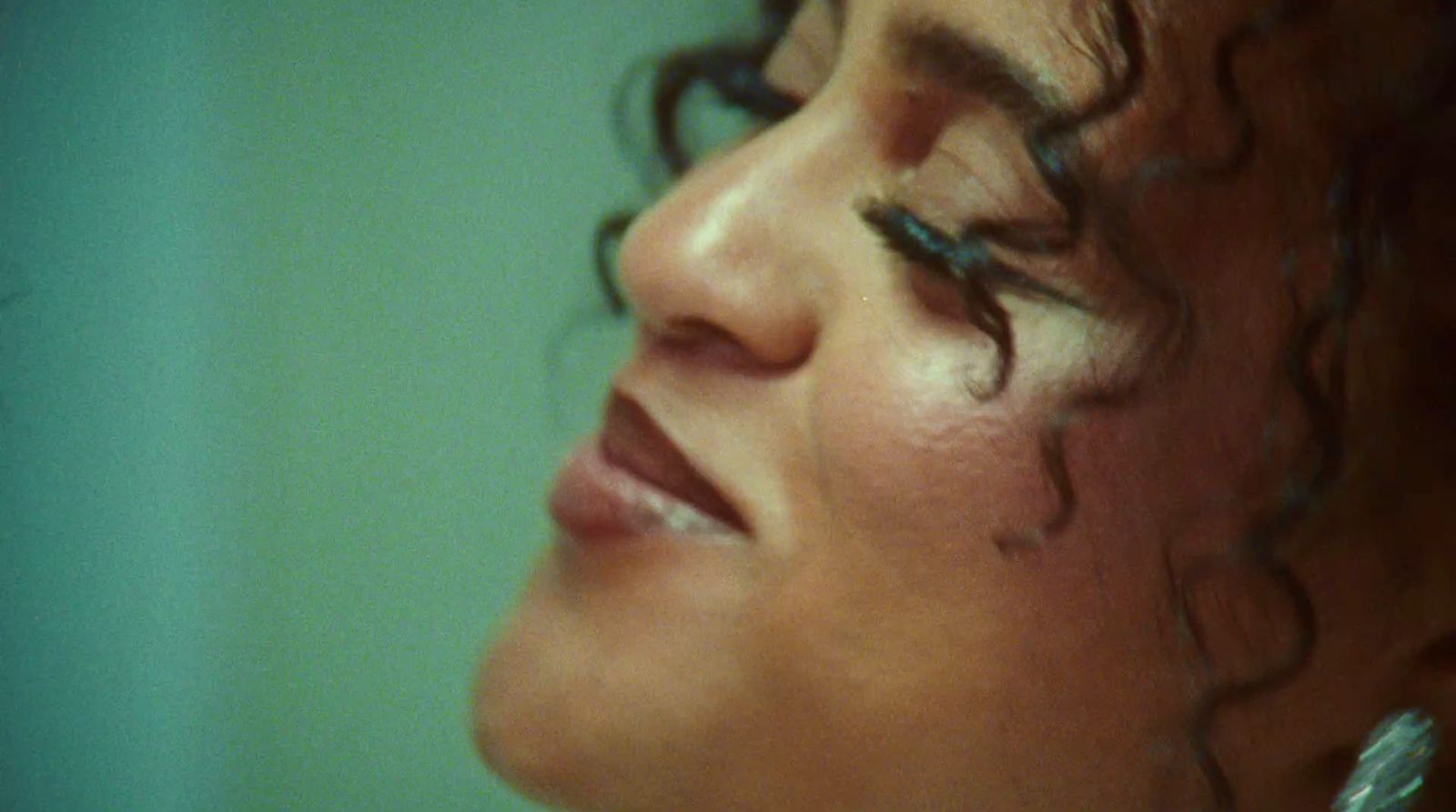 a close up of a woman with wet hair