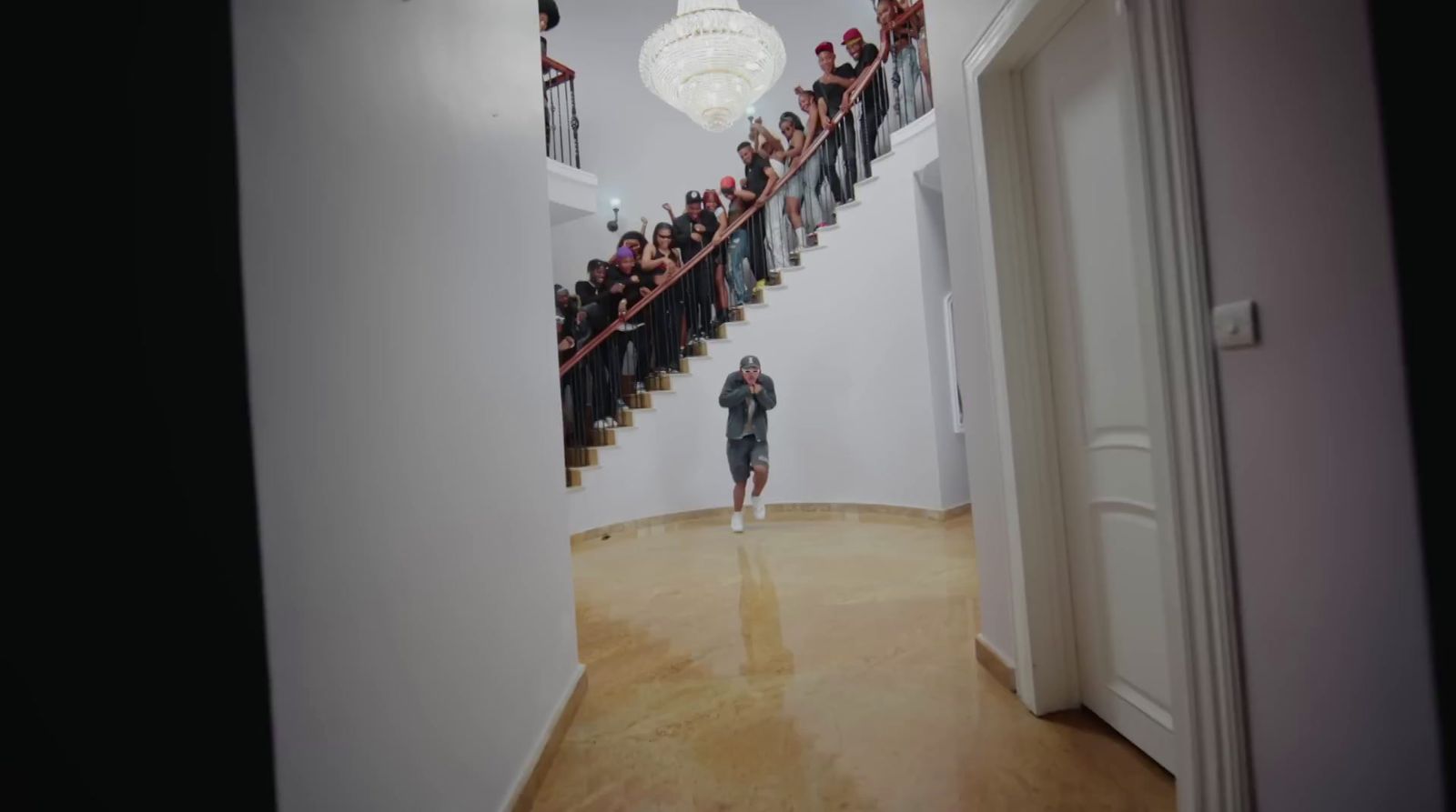 a group of people standing on top of a staircase