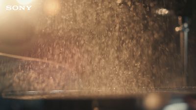 a close up of a shower head in a bathroom