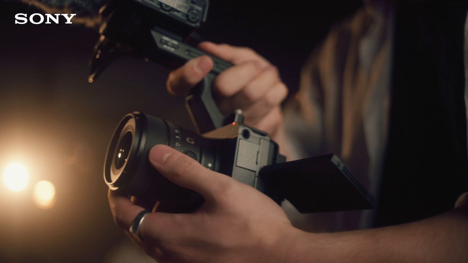 a person holding a camera in their hands