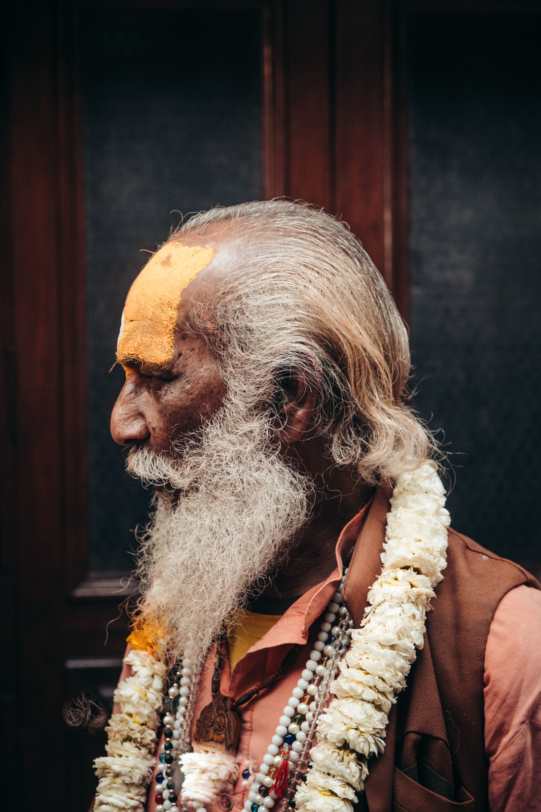 a man with a long white beard and a white beard