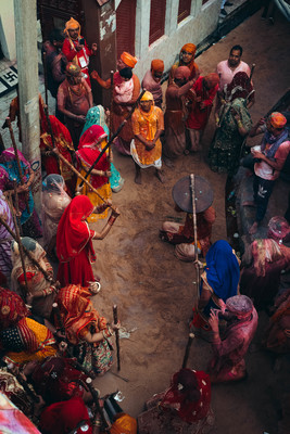 a group of people standing around each other