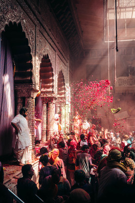 a group of people standing in front of a stage