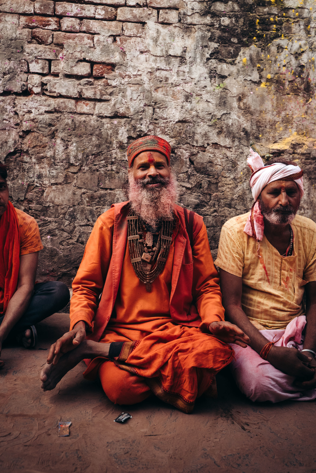 a group of men sitting next to each other