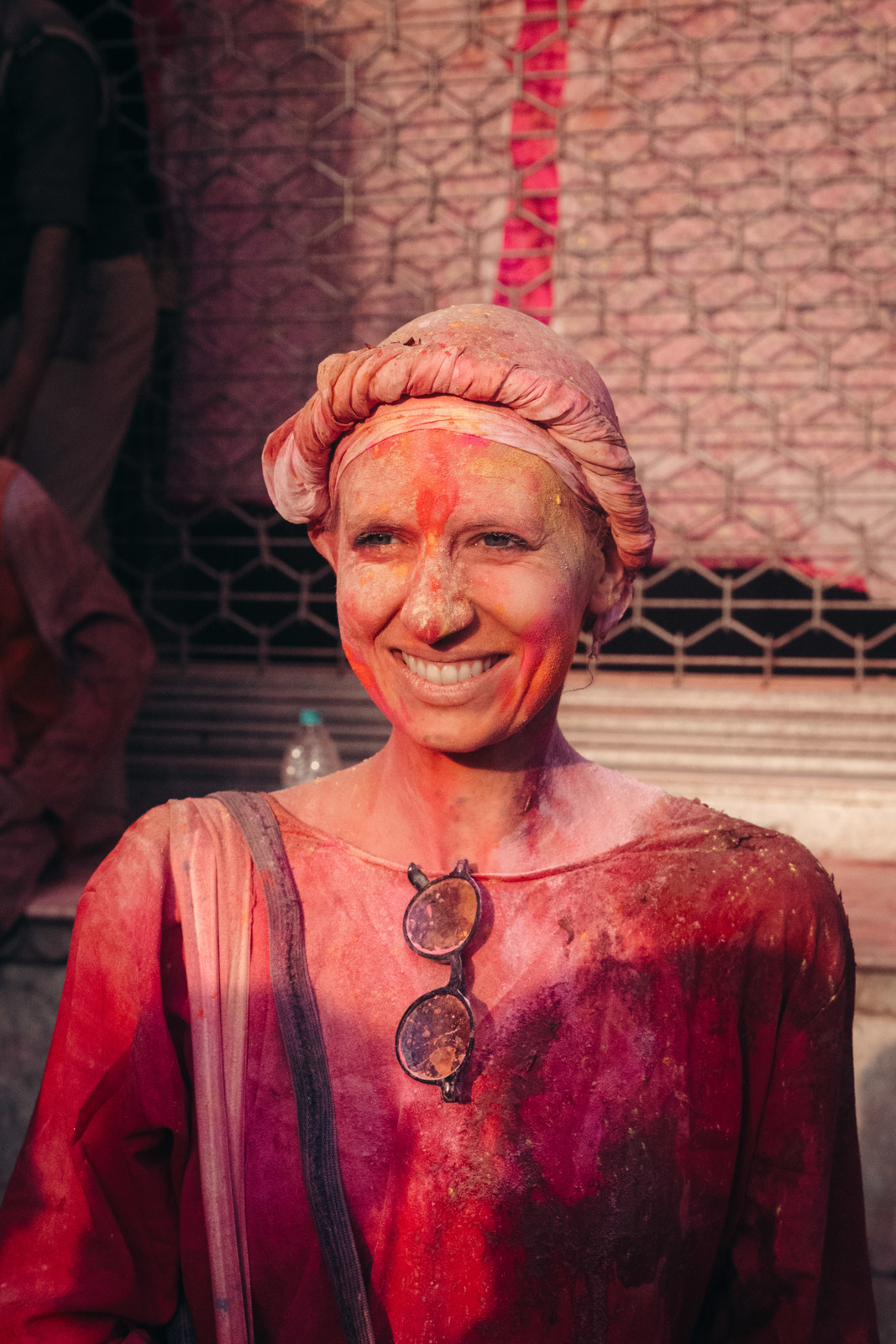 a woman with red paint on her face