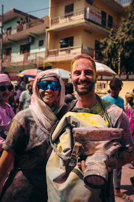 a couple of people that are standing in the dirt