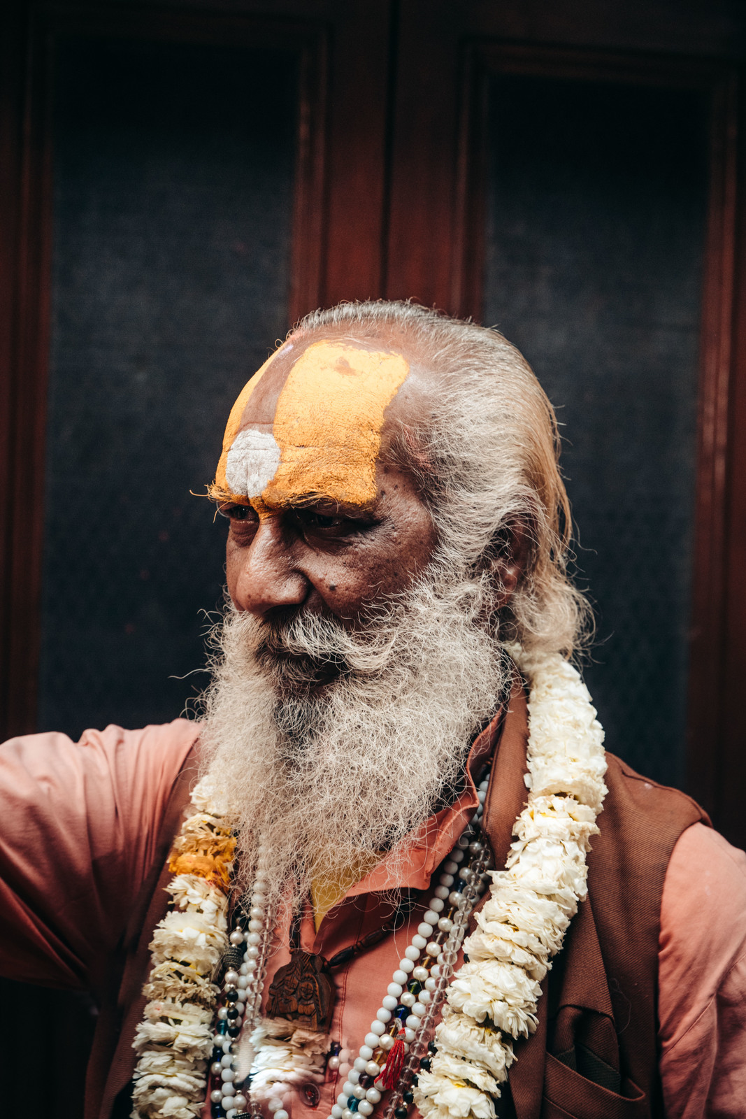 a man with a long beard and a white beard