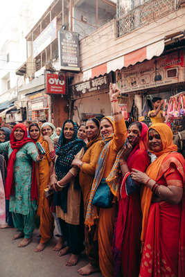 a group of women standing next to each other