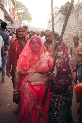 a group of people walking down a street